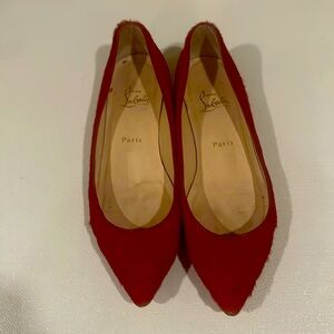 Gently worn made and bought in Paris red calfskin Louboutin flats.